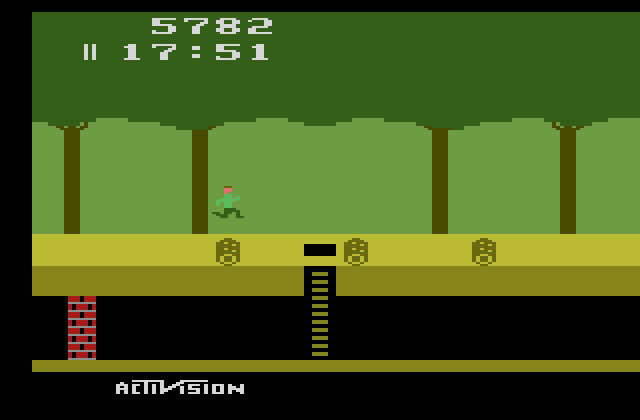 Pitfall! Atari 2600 Screenshot: Getting hit by a log doesn't cost a life, but will reduce your score.