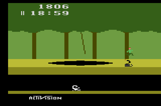 Pitfall! Atari 2600 Screenshot: Jump over the snakes.