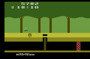 Pitfall! for Atari 2600 - Leaping over a rolling log.