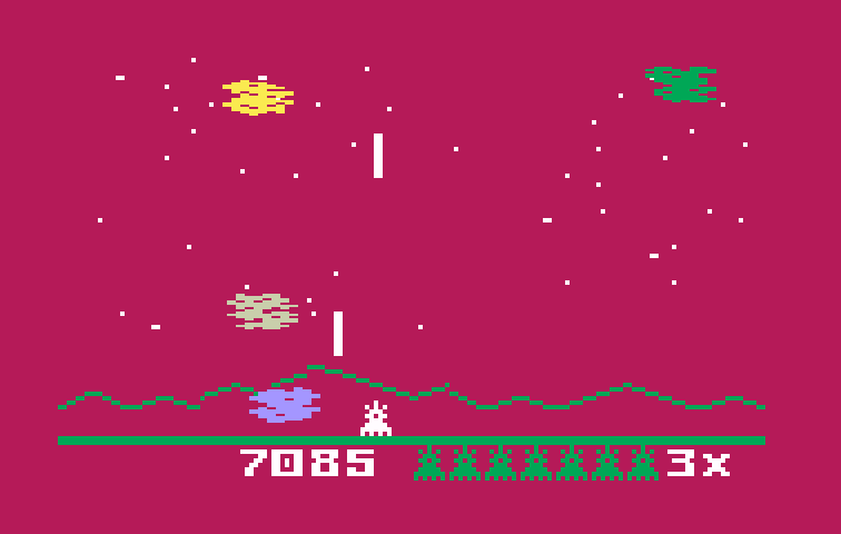 Astrosmash Intellivision Screenshot: Be careful with large meteors, sometimes they split into two when shot.