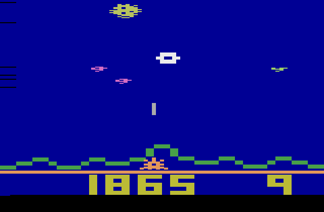 Astrosmash Atari 2600 Screenshot: Shoot the white spinners before the land!