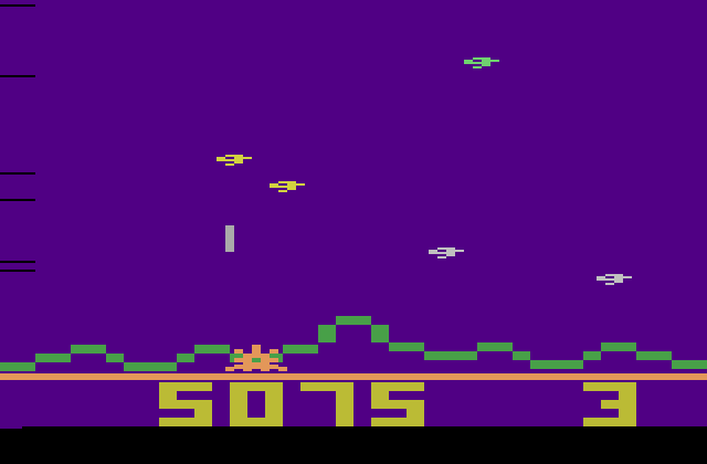 Astrosmash Atari 2600 Screenshot: Small rocks are harder to hit, but they award (or deduct!) more points.