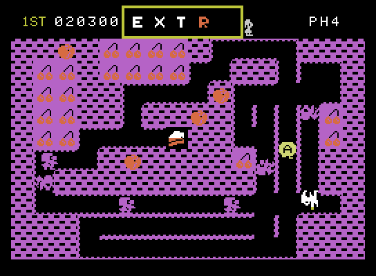 Mr. Do! ColecoVision Screenshot: Catch the "A" to complete part of the word EXTRA.