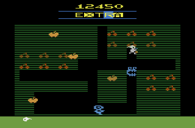 Mr. Do! Atari 2600 Screenshot: Don't get caught by that bad guy!