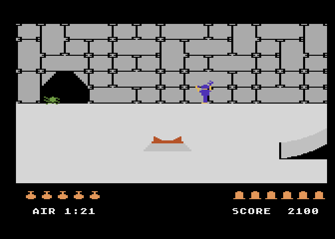 Quest for Quintana Roo Atari 5200 Screenshot: Using the chisel to see if there's anything hidden behind the wall...