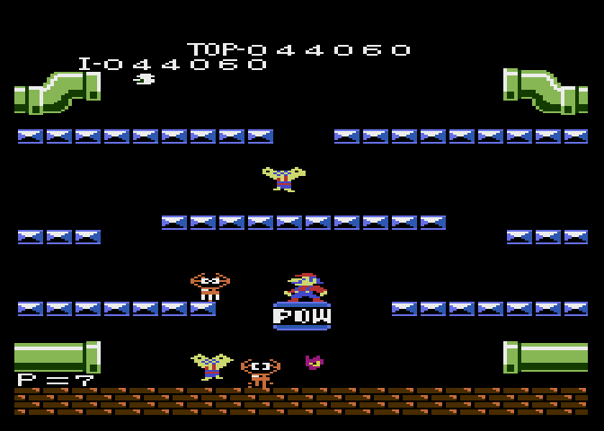 Mario Bros. Atari 7800 Screenshot: You can stand on the POW switch to escape from pests.