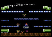 Mario Bros. for Atari 7800 - You can stand on the POW switch to escape from pests.