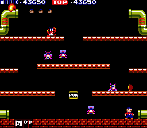 Mario Bros. Arcade Screenshot: One opponent flipped over, now run to kick it off of the platform!