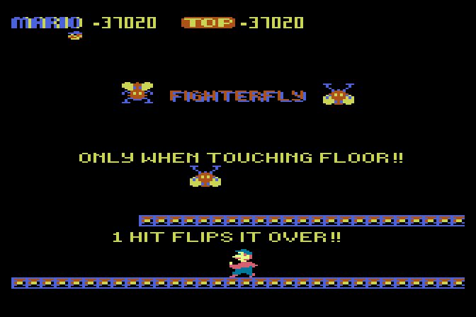 Mario Bros. Atari 8-bit Screenshot: Fighterflies can only be flipped when they are touching the floor.