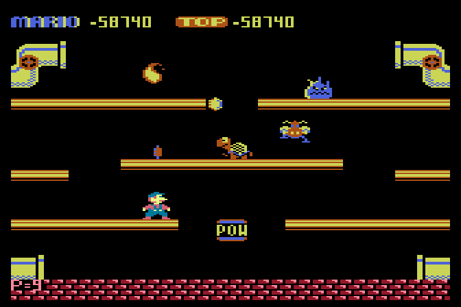 Mario Bros. Atari 8-bit Screenshot: Try to stop Slipice before it freezes a platform.