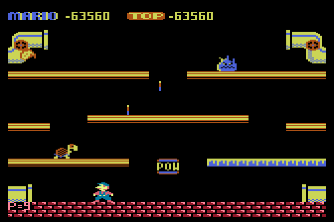 Mario Bros. Atari 8-bit Screenshot: Frozen platforms are slippery making it difficult to change direction when running...