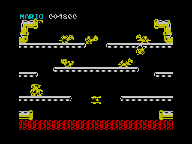Mario Bros. ZX Spectrum Screenshot: Knock the pests off the platform when they're flipped upside down.