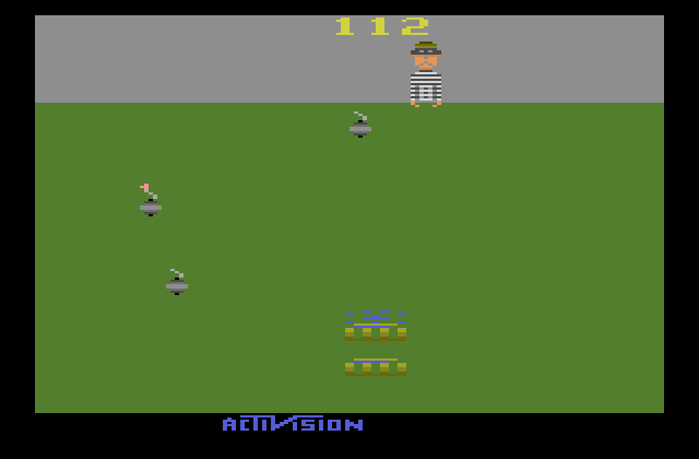Kaboom! Atari 2600 Screenshot: Splash! Caught a bomb, more to go...