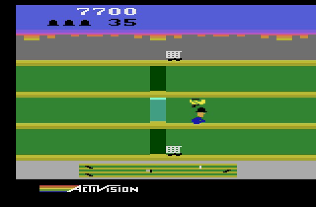Keystone Kapers Atari 2600 Screenshot: If you can catch the elevator, sometimes it helps. Other times, it's going the wrong way and costs time.