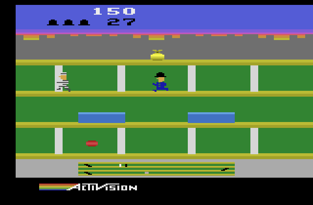 Keystone Kapers Atari 2600 Screenshot: Chasing Harry Hooligan.