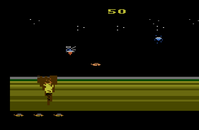 James Bond 007 Atari 2600 Screenshot: Shoot the diamonds to temporarily illuminate the sky.