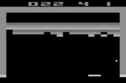 Breakout for Atari 2600 - Don't miss the ball as it bounces off of the wall...