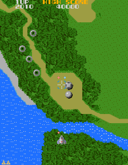 Xevious Arcade Screenshot: Crossing a river...