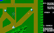 Xevious for Sharp X1 - Those things travelling along the roads shoot at you, be careful!