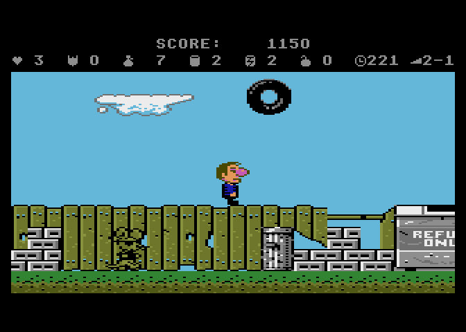 Scrapyard Dog Atari 7800 Screenshot: Don't let the tire hit you on the head!