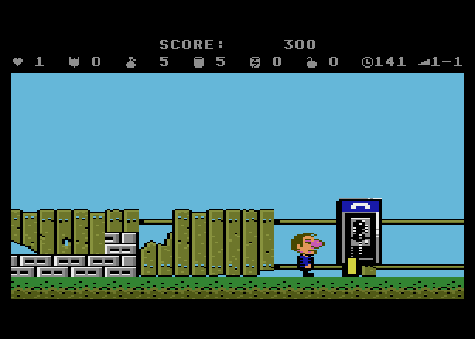 Scrapyard Dog Atari 7800 Screenshot: The phone at the end of the level...