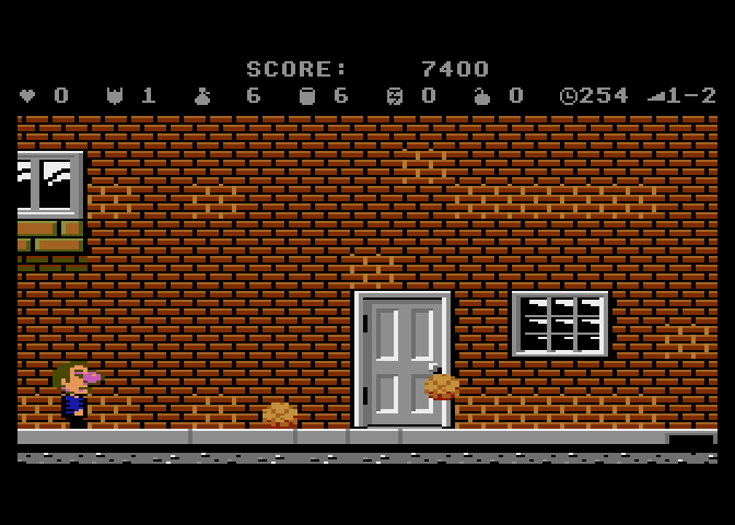 Scrapyard Dog Atari 7800 Screenshot: Bouncing rocks are dangerous, be sure to dodge them!