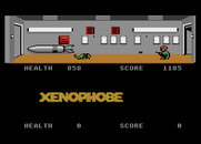 Xenophobe for Atari 7800 - Crouch to duck alien fire or shoot aliens close to the ground...