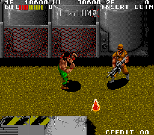 Ikari III: The Rescue Arcade Screenshot: The guys with guns are tough, but sometimes you can take their weapon!