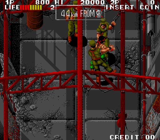 Ikari III: The Rescue Arcade Screenshot: Fighting my way down a corridor...