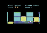 Elevator Action for Commodore 64 - End of Round 1, driving to the next building...