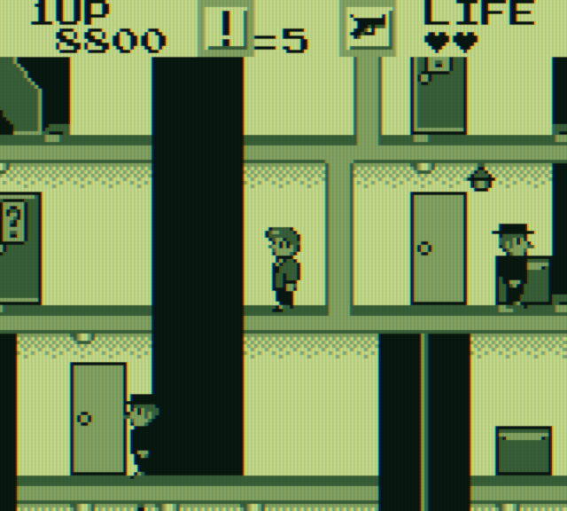 Elevator Action Game Boy Screenshot: Trapped in a corner, so I'm waiting for an elevator to get out...