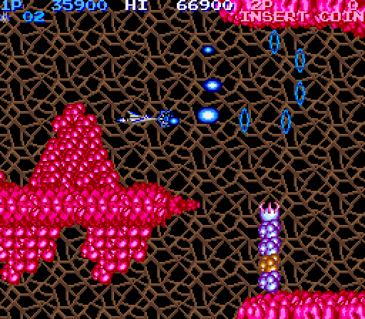 Life Force Arcade Screenshot: Don't get caught by the reaching hands!