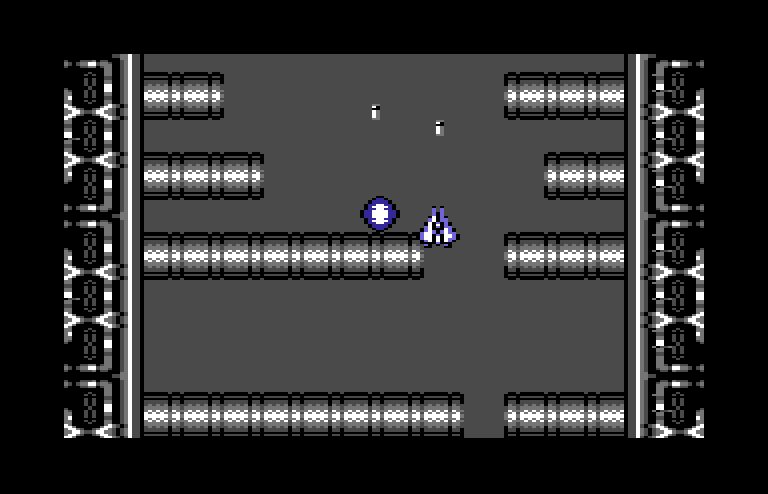 Life Force Commodore 64 Screenshot: As a final challenge you need to navigate through these barriers.