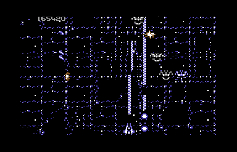 Life Force Commodore 64 Screenshot: Lasers are often the weapon of choice...