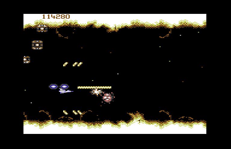 Life Force Commodore 64 Screenshot: Blasting some of the many opponents that appear...