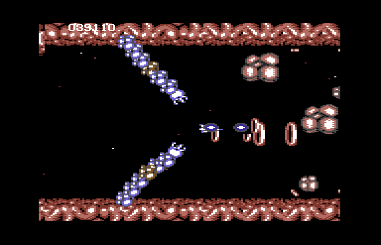 Life Force Commodore 64 Screenshot: These things increase in size after you shoot them.