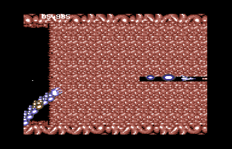 Life Force Commodore 64 Screenshot: Fire rapidly to blast through this barrier!