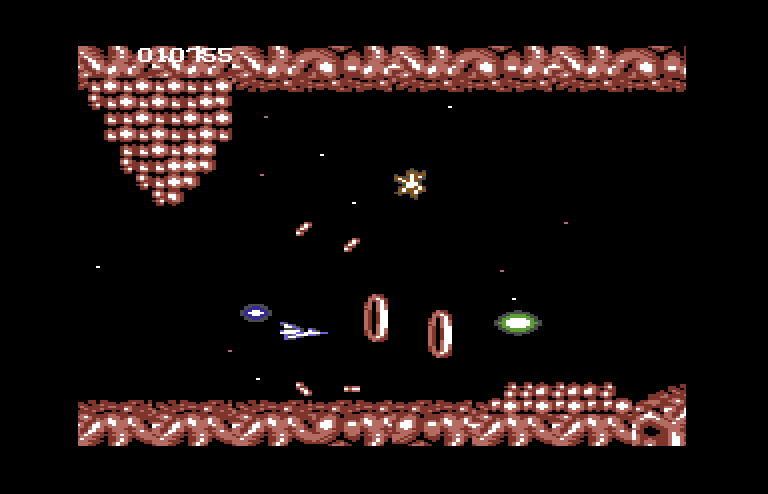 Life Force Commodore 64 Screenshot: Collect the green multiple for more firepower.