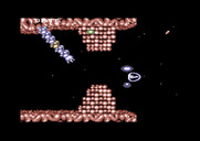 Life Force for Commodore 64 - Flying through a narrow area...