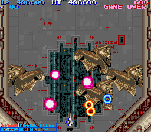Life Force Arcade Screenshot: These giant heads can cause trouble...shoot them if you can!