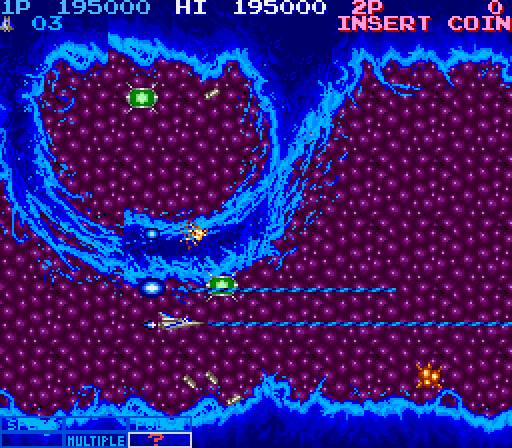 Life Force Arcade Screenshot: Acid flames can appear from the top or bottom of the screen.