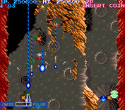 Life Force for Arcade - Some walls in this stage can be shot, others need to be avoided.