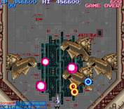Life Force for Arcade - These giant heads can cause trouble...shoot them if you can!