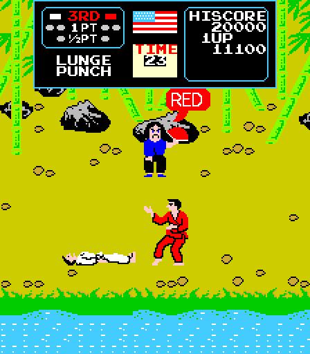Karate Champ Arcade Screenshot: White knocked down by red.