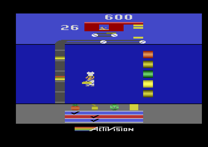 Pressure Cooker Atari 2600 Screenshot: Carry the top piece of the bun to the conveyer belt to complete an order.