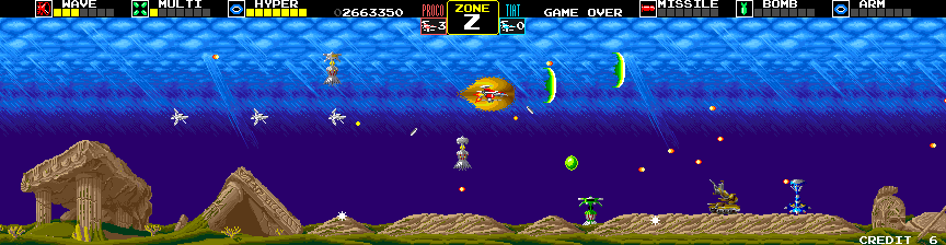 Darius Arcade Screenshot: Another green orb, collect it to increase bomb power.