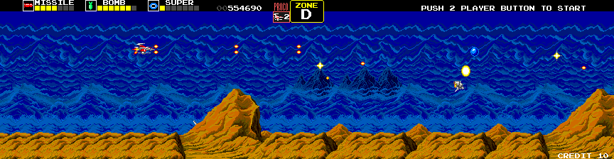 Darius Arcade Screenshot: Collect the blue orb to increase your shield power.