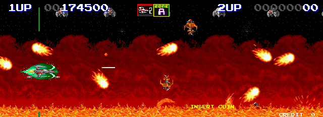 Darius II Arcade Screenshot: Lots of fire and other obstacles to avoid on the first level!