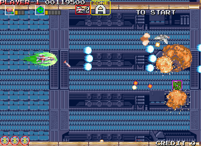Darius Gaiden Arcade Screenshot: A weapons upgrade helps destroy numerous enemies at once...
