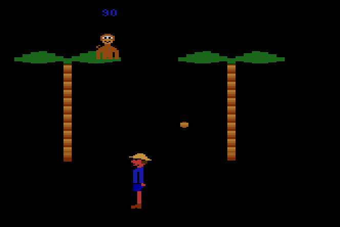 CocoNuts Atari 2600 Screenshot: My umbrella is lost, only a helmet protects me now!